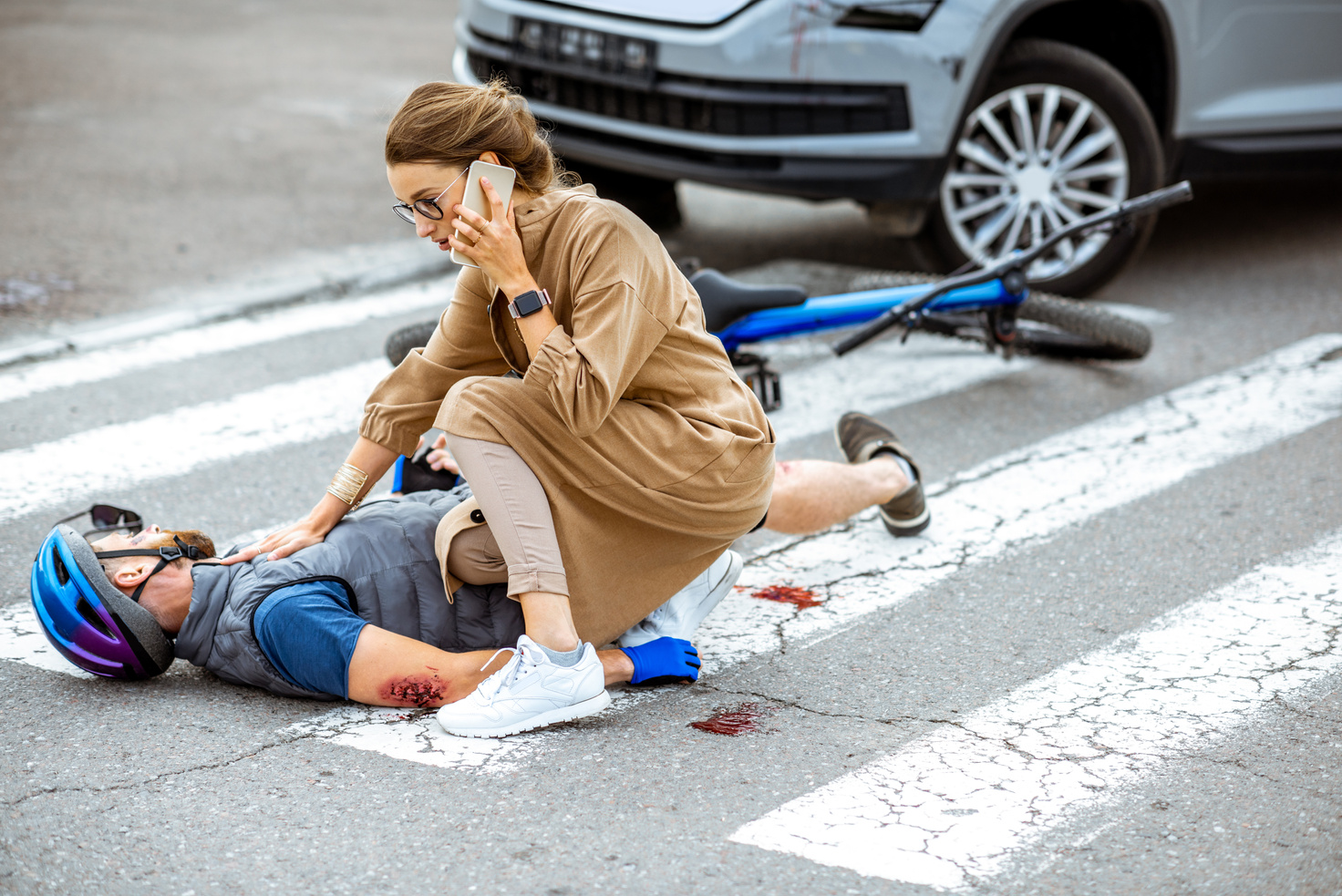 Woman Calling Emergency After Colliding with Cyclist